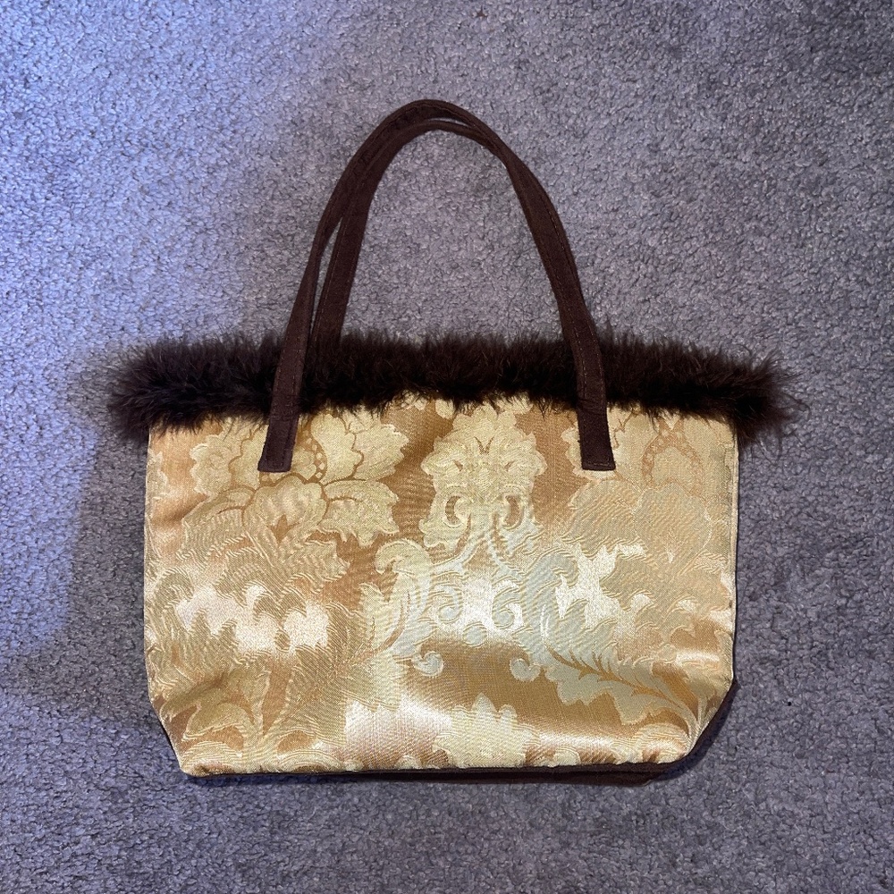 Once upon a rose gold handbag with faux fur